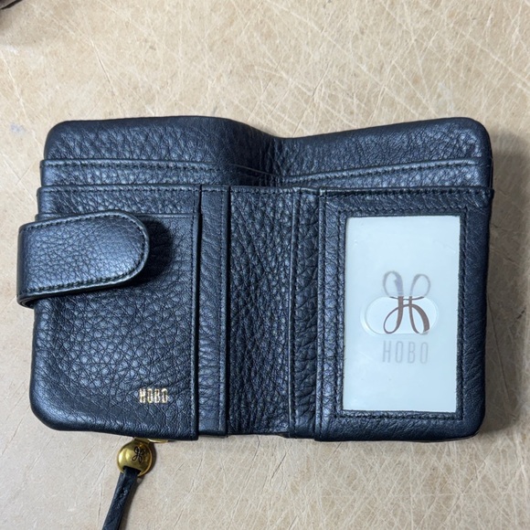 HOBO Handbags - HOBO Black Textured Leather Wallet New Without Tags